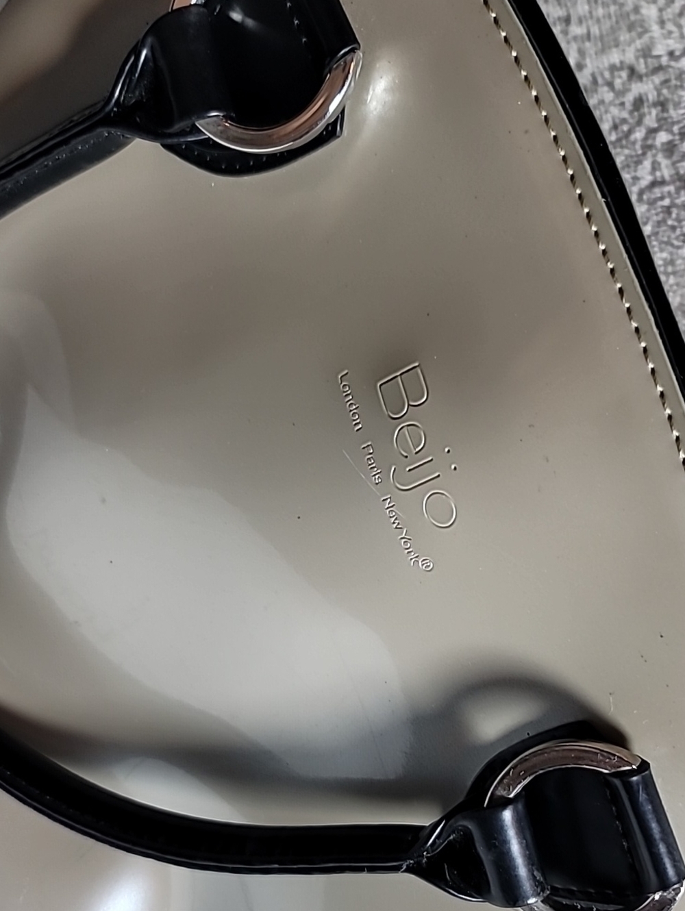 Beijo Creamy Silver Patent Finish Dome Bag with Black Handles